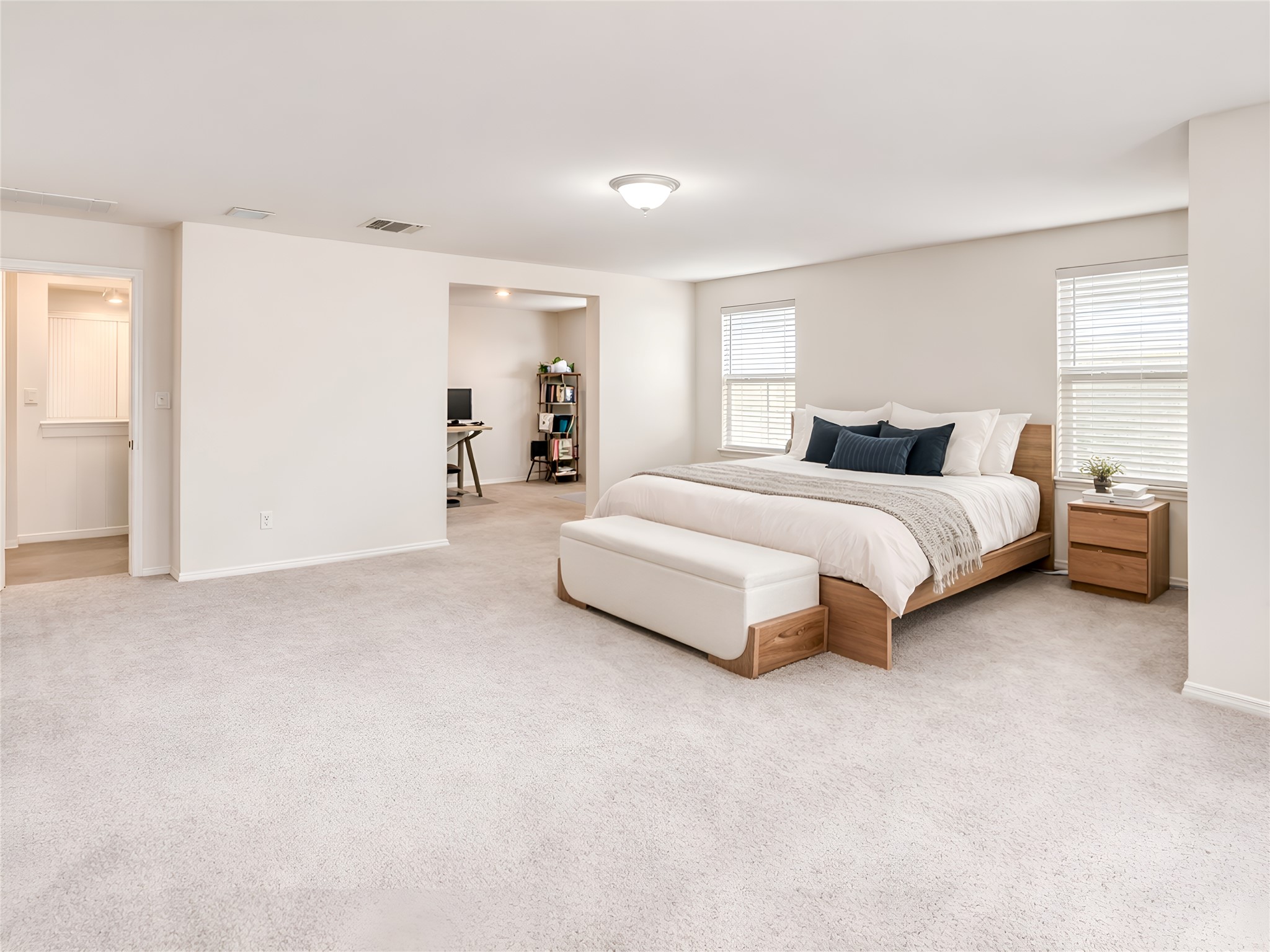 159 Kennicott Drive Kyle, TX 78640 - Photo 19 of 27 a bedroom with a bed and a couch