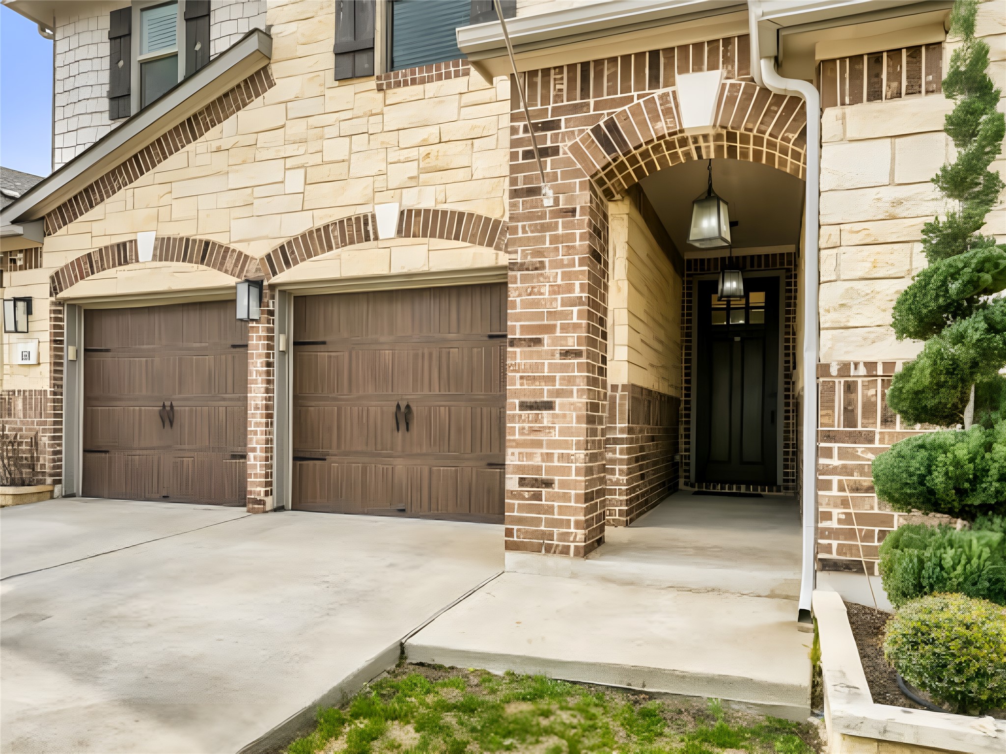 159 Kennicott Drive Kyle, TX 78640 - Photo 3 of 27 a front view of a house with a garage