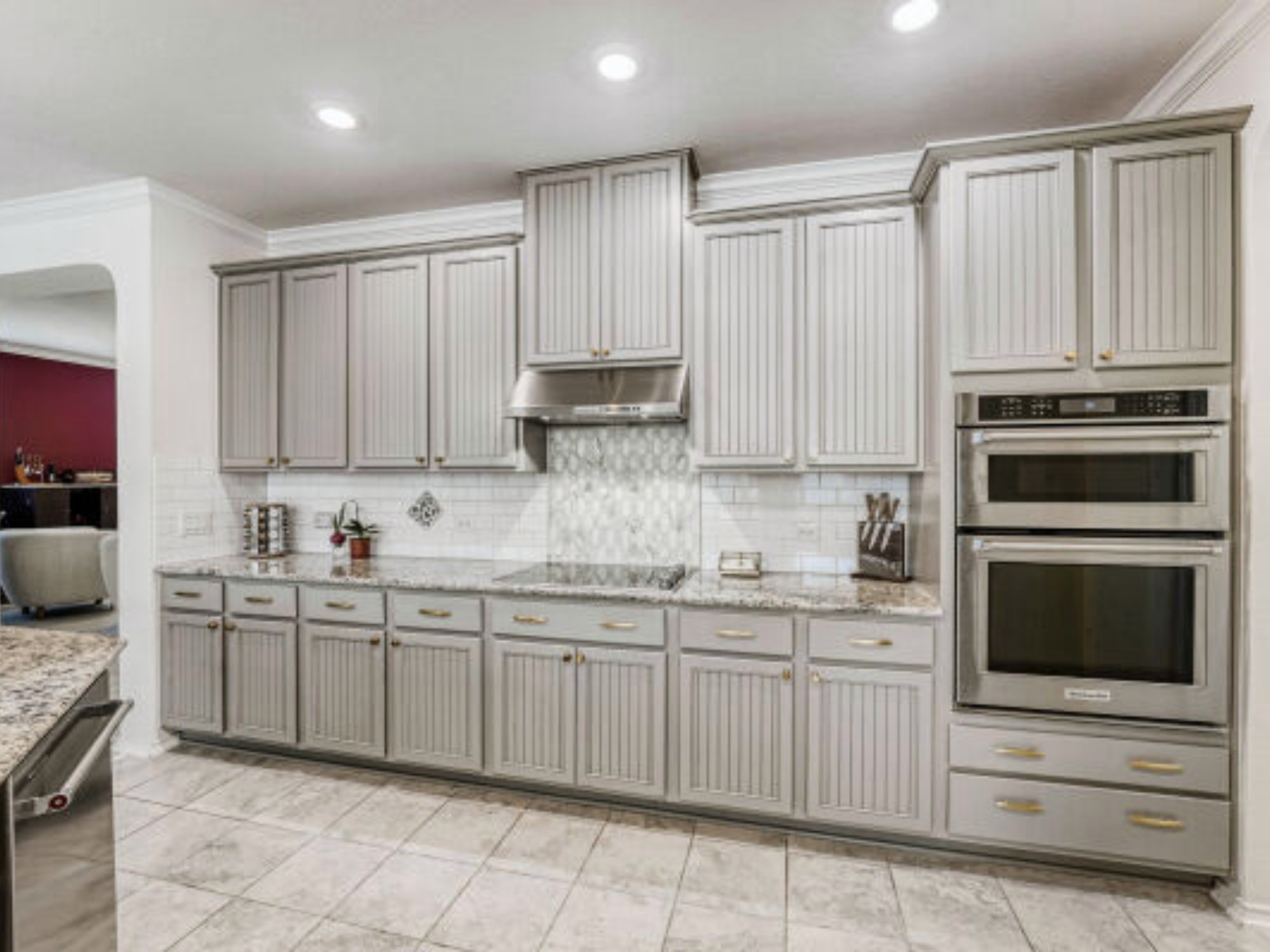 159 Kennicott Drive Kyle, TX 78640 - Photo 4 of 27 a kitchen with stainless steel appliances granite countertop a stove sink and cabinets