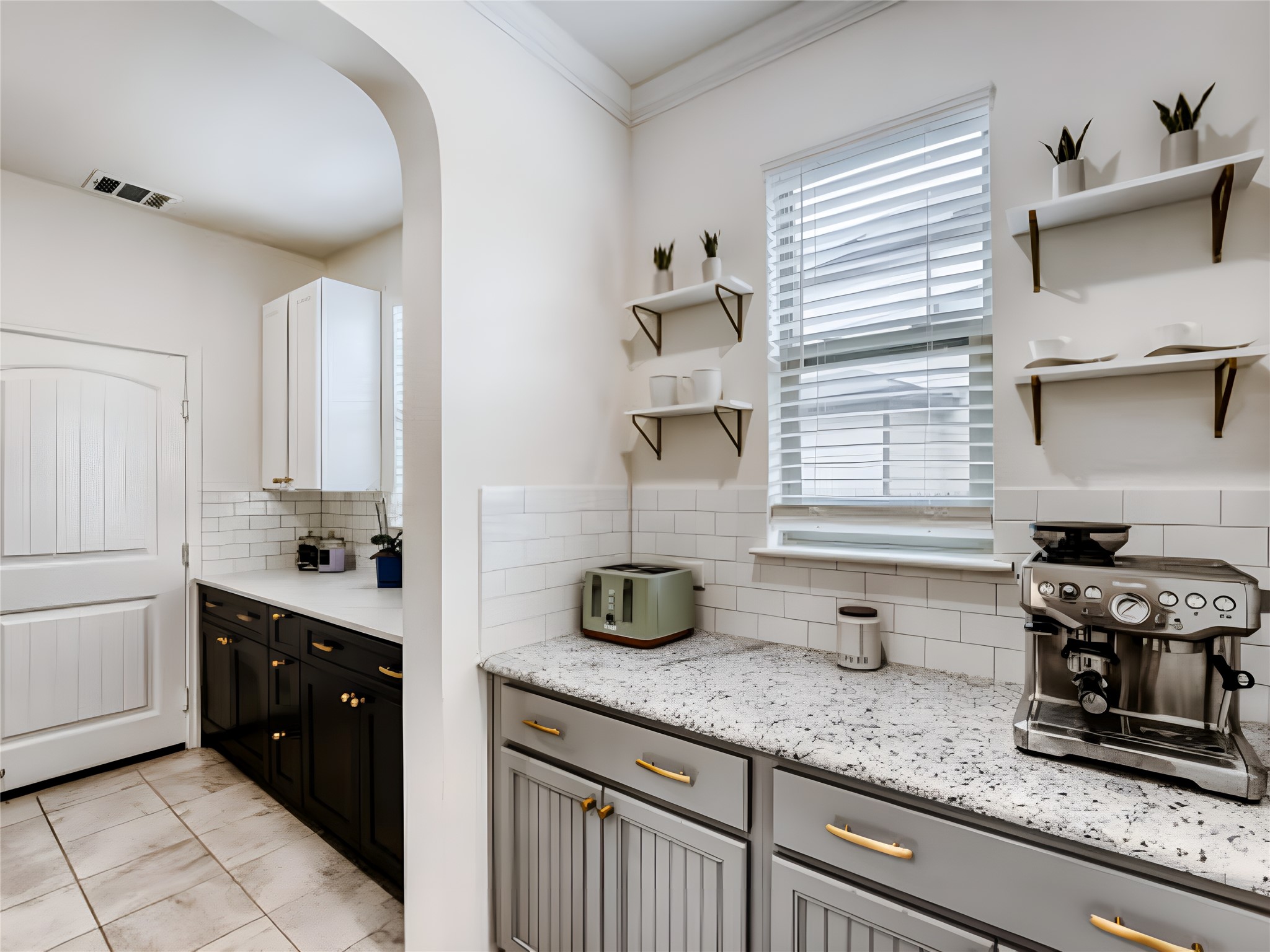 159 Kennicott Drive Kyle, TX 78640 - Photo 6 of 27 a kitchen with a sink and a stove top oven