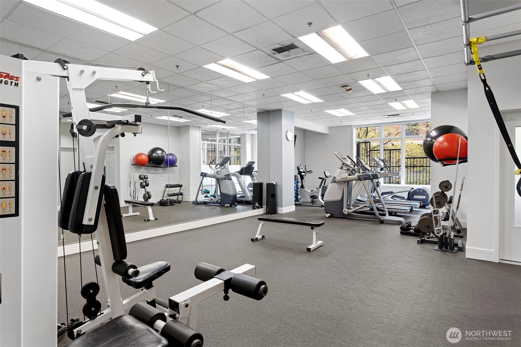 2801 1st Avenue, Unit 612 Seattle, WA 98121 - Photo 24 of 25 a view of a room with gym equipment