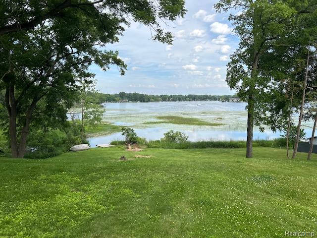 15471 Whitaker Road Linden, MI 48451 - Photo 17 of 17 view of Pine Lake. Small dock platform at the lake for pontoon and/or fishing.