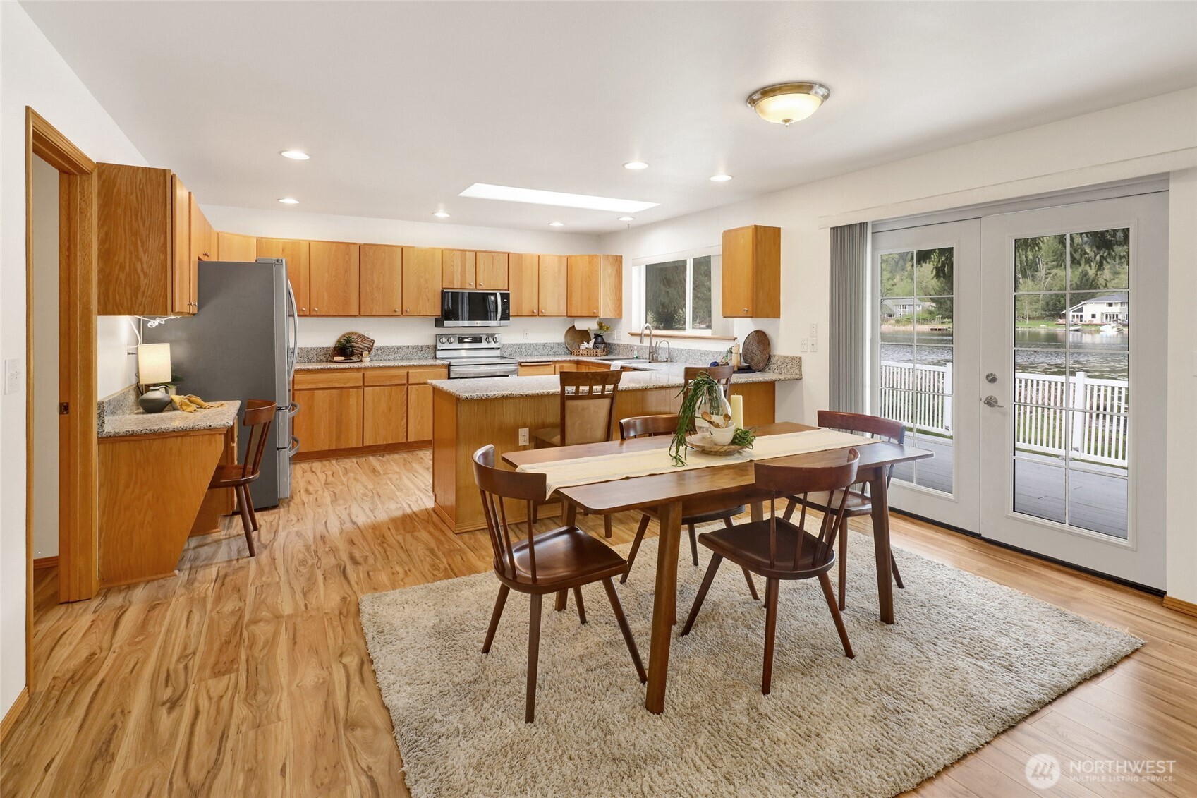 659 Cain Lake Road Sedro-Woolley, WA 98284 - Photo 16 of 40 a view of a dining room with furniture