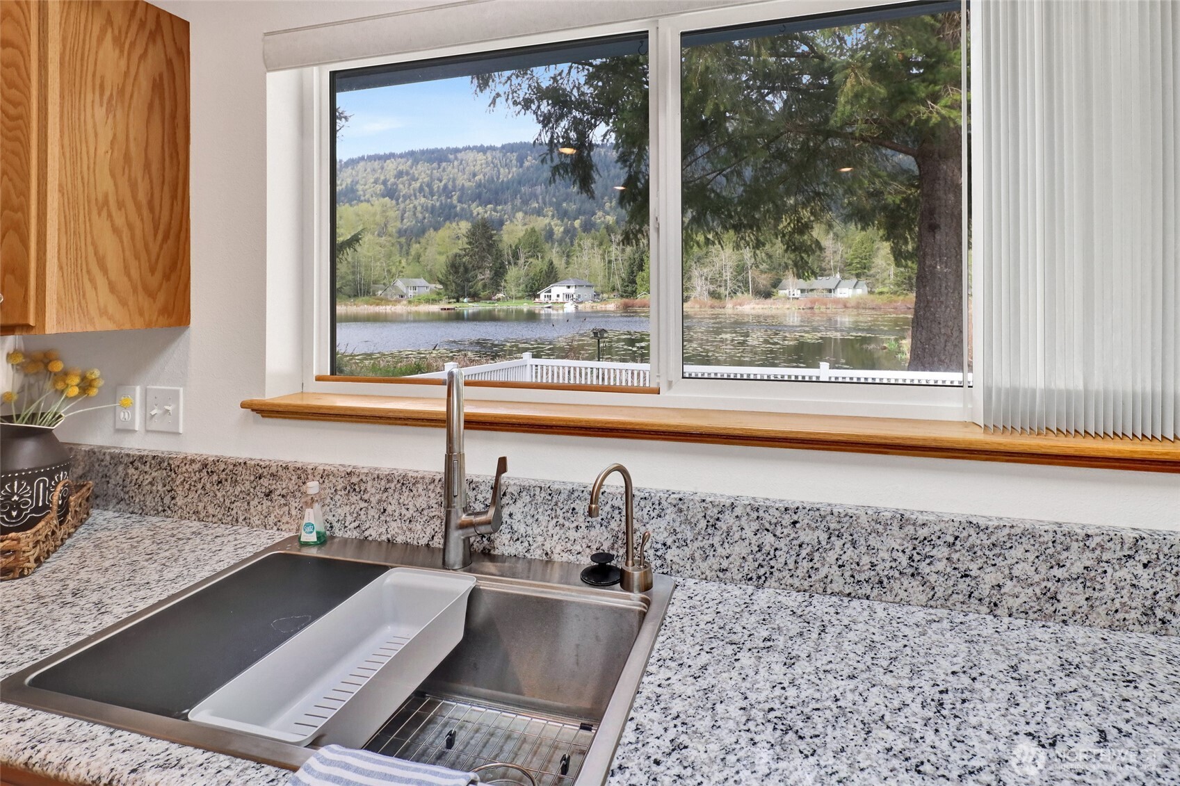 659 Cain Lake Road Sedro-Woolley, WA 98284 - Photo 19 of 40 a view of a kitchen with a sink and a window