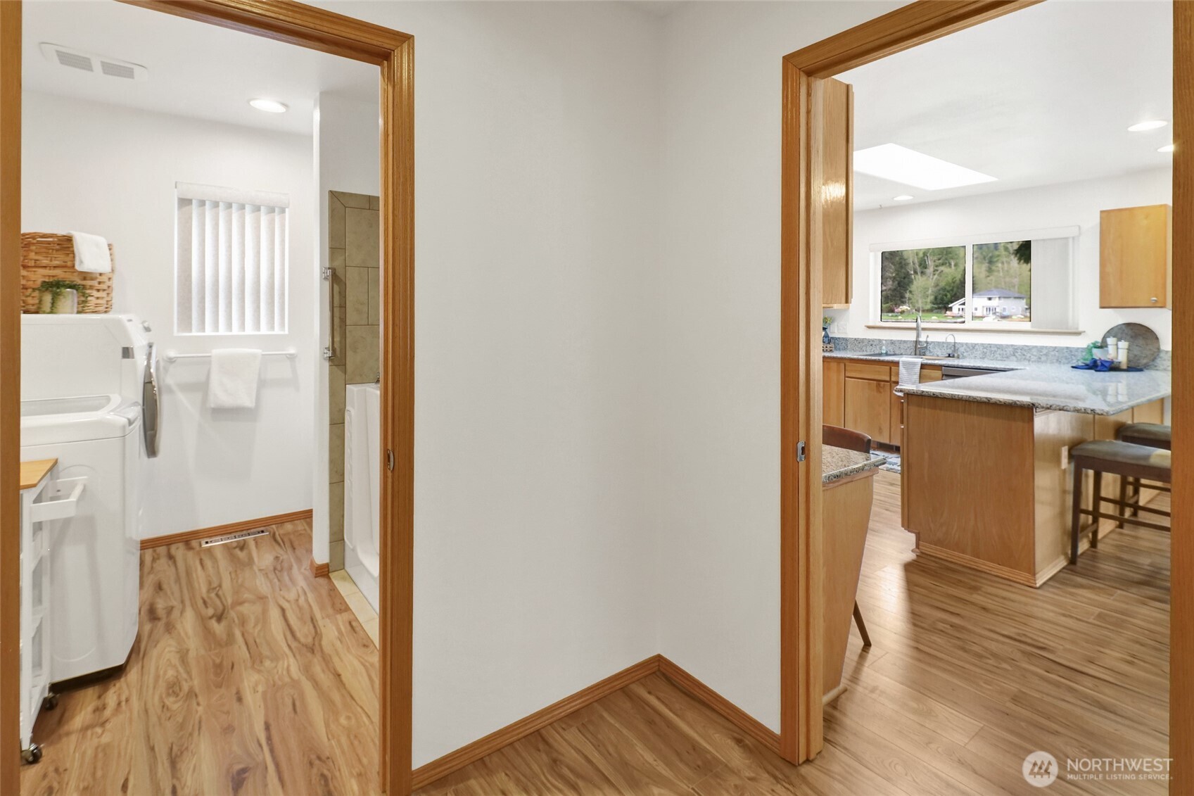 659 Cain Lake Road Sedro-Woolley, WA 98284 - Photo 22 of 40 a view of bathroom with bathtub and wooden floor