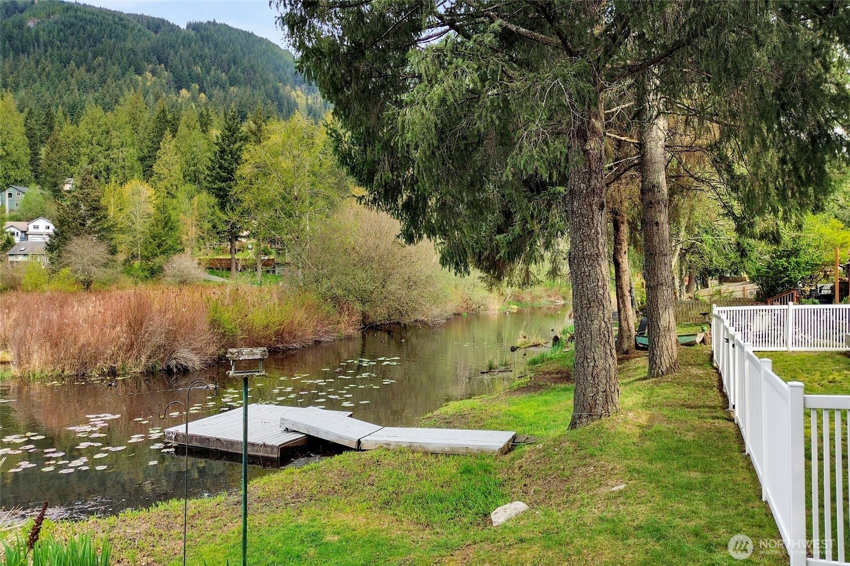 659 Cain Lake Road Sedro-Woolley, WA 98284 - Photo 28 of 40 a view of a swimming pool with a yard