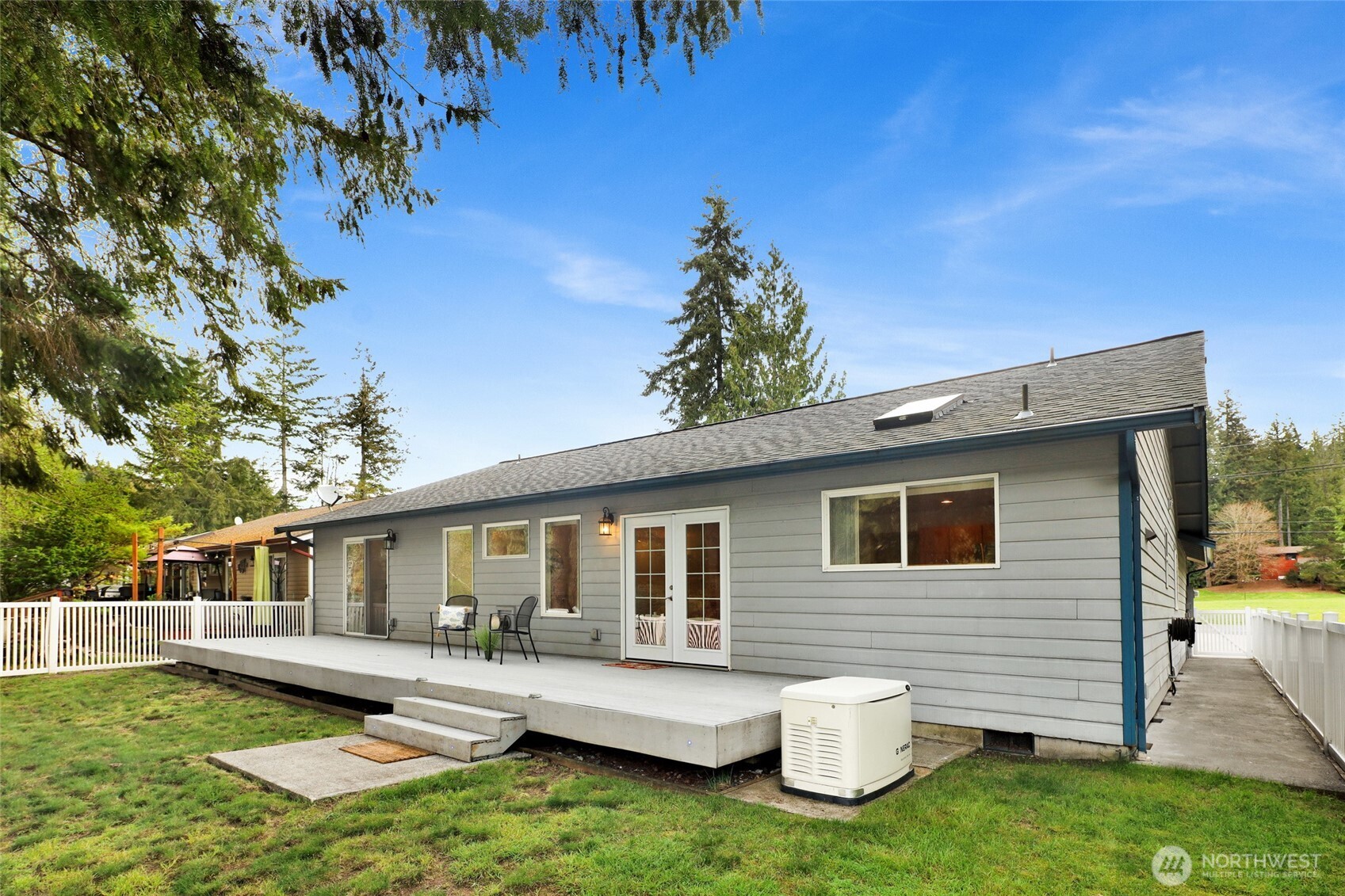 659 Cain Lake Road Sedro-Woolley, WA 98284 - Photo 30 of 40 a view of a house with backyard