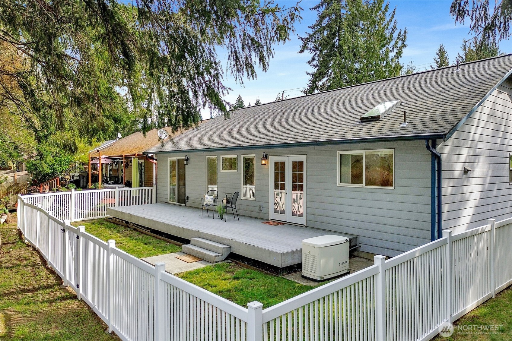659 Cain Lake Road Sedro-Woolley, WA 98284 - Photo 3 of 40 a view of house with wooden deck and furniture
