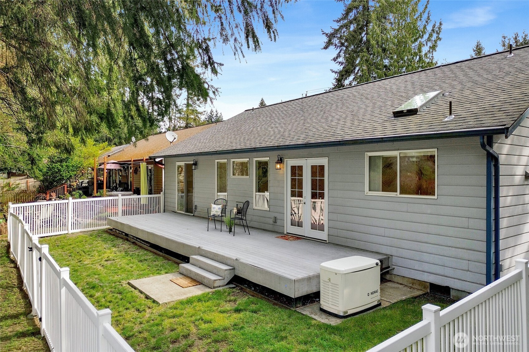 659 Cain Lake Road Sedro-Woolley, WA 98284 - Photo 35 of 40 a view of a house with pool and sitting area
