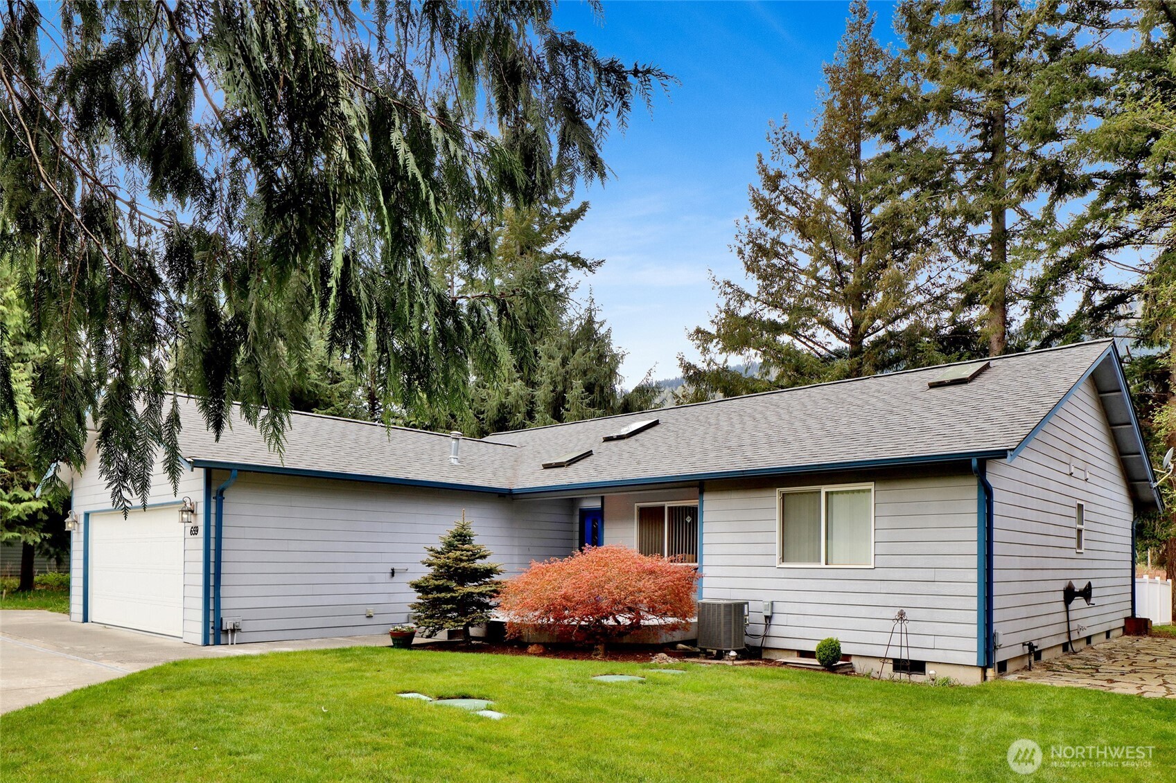 659 Cain Lake Road Sedro-Woolley, WA 98284 - Photo 7 of 40 a front view of house with yard
