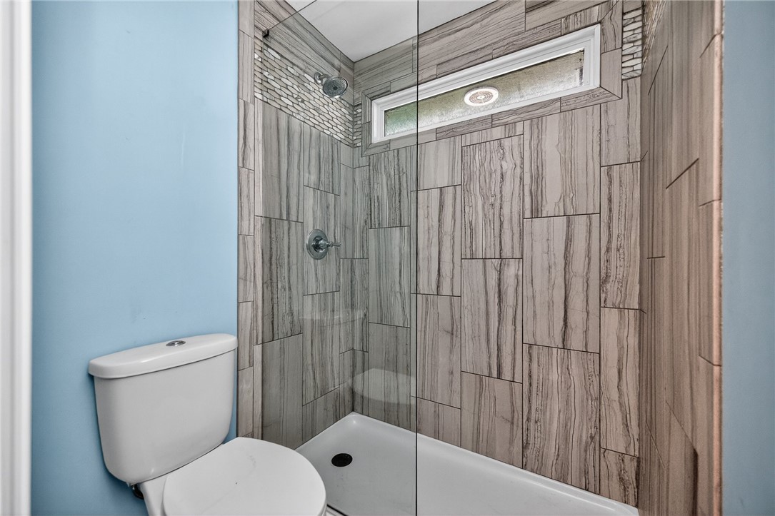 4747 Fawnwood Road Dayton, OH 45429 - Photo 40 of 58 This bathroom showcases a sleek walk-in shower, offering modern design and convenience.