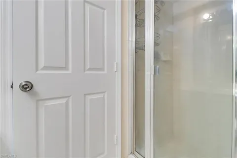 a view of an empty room with a large window