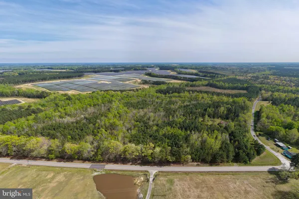 a view of a lake with a yard