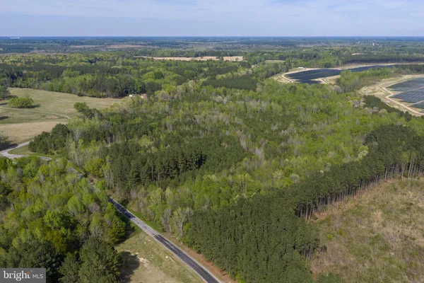 a view of a lake with a yard