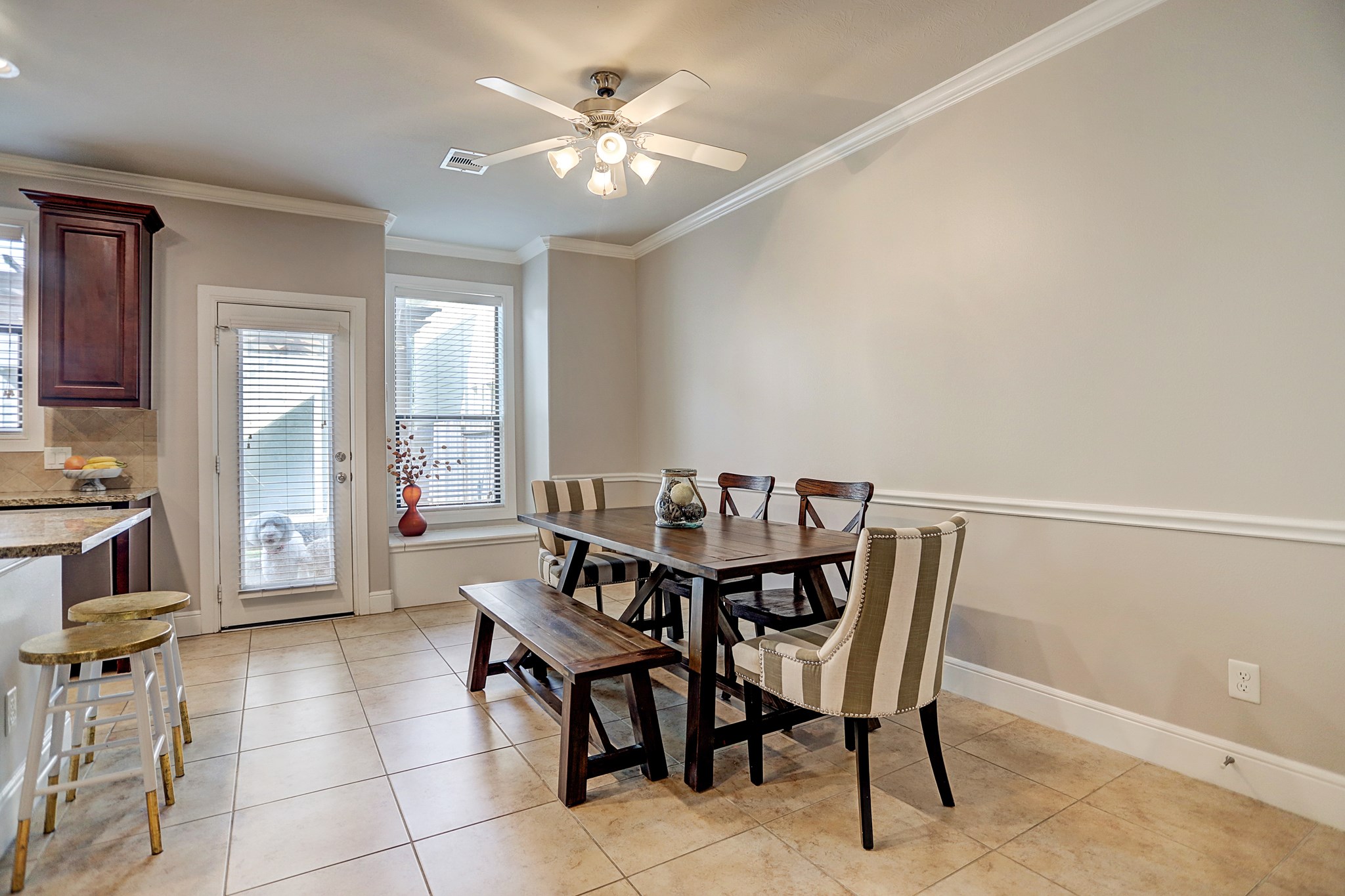 213 West 26th Street Houston, TX 77008 - Photo 12 of 33 a view of a dining room with furniture and a chandelier