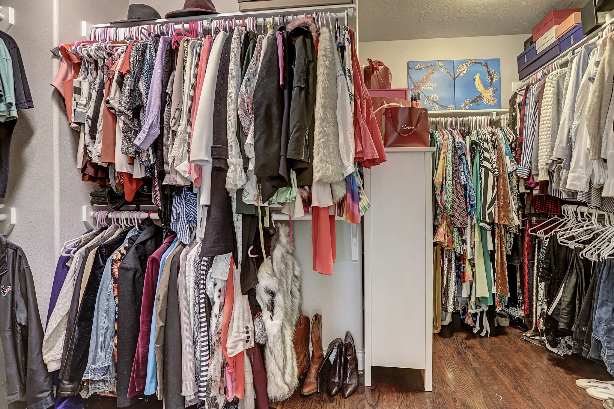 213 West 26th Street Houston, TX 77008 - Photo 17 of 33 a view of walk in closet with clothes