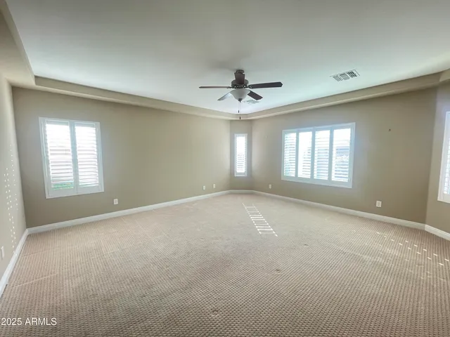 a bathroom with a sink vanity and mirror