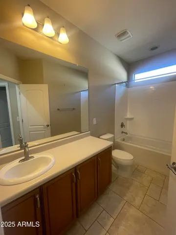 a sign board with yard in front of it