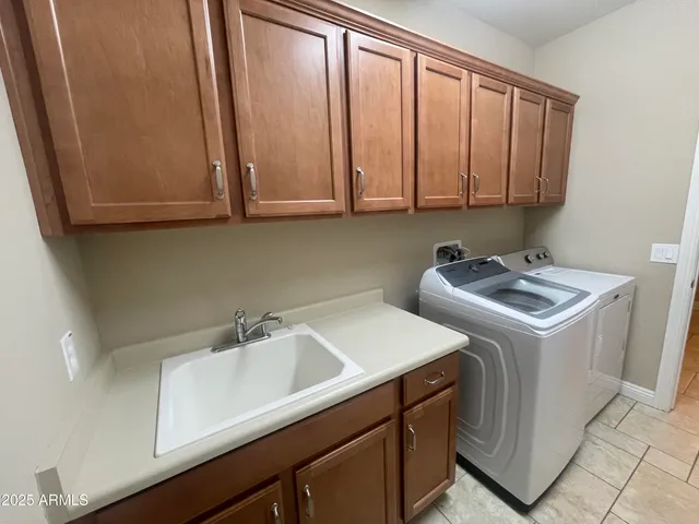 a view of a park with large trees