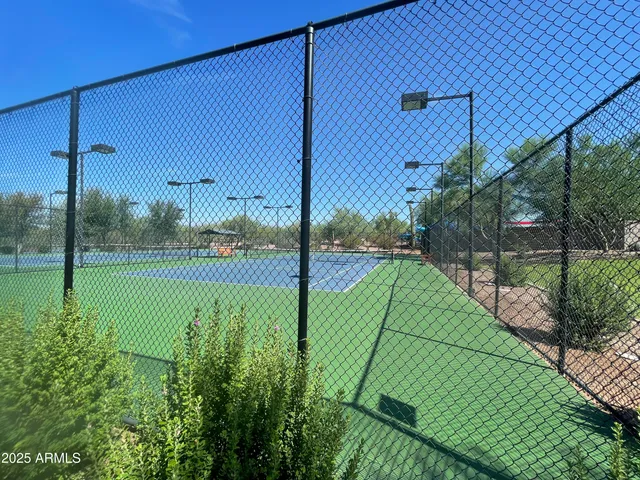 a view of a backyard with sitting area
