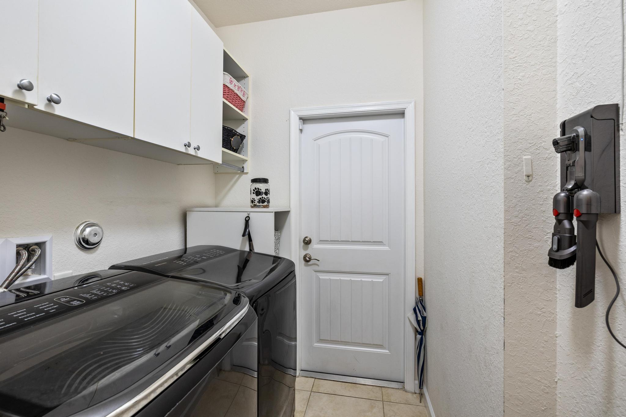 7034 Limestone Cay Road Jupiter, FL 33458 - Photo 23 of 43 a bedroom with a bed and cabinets