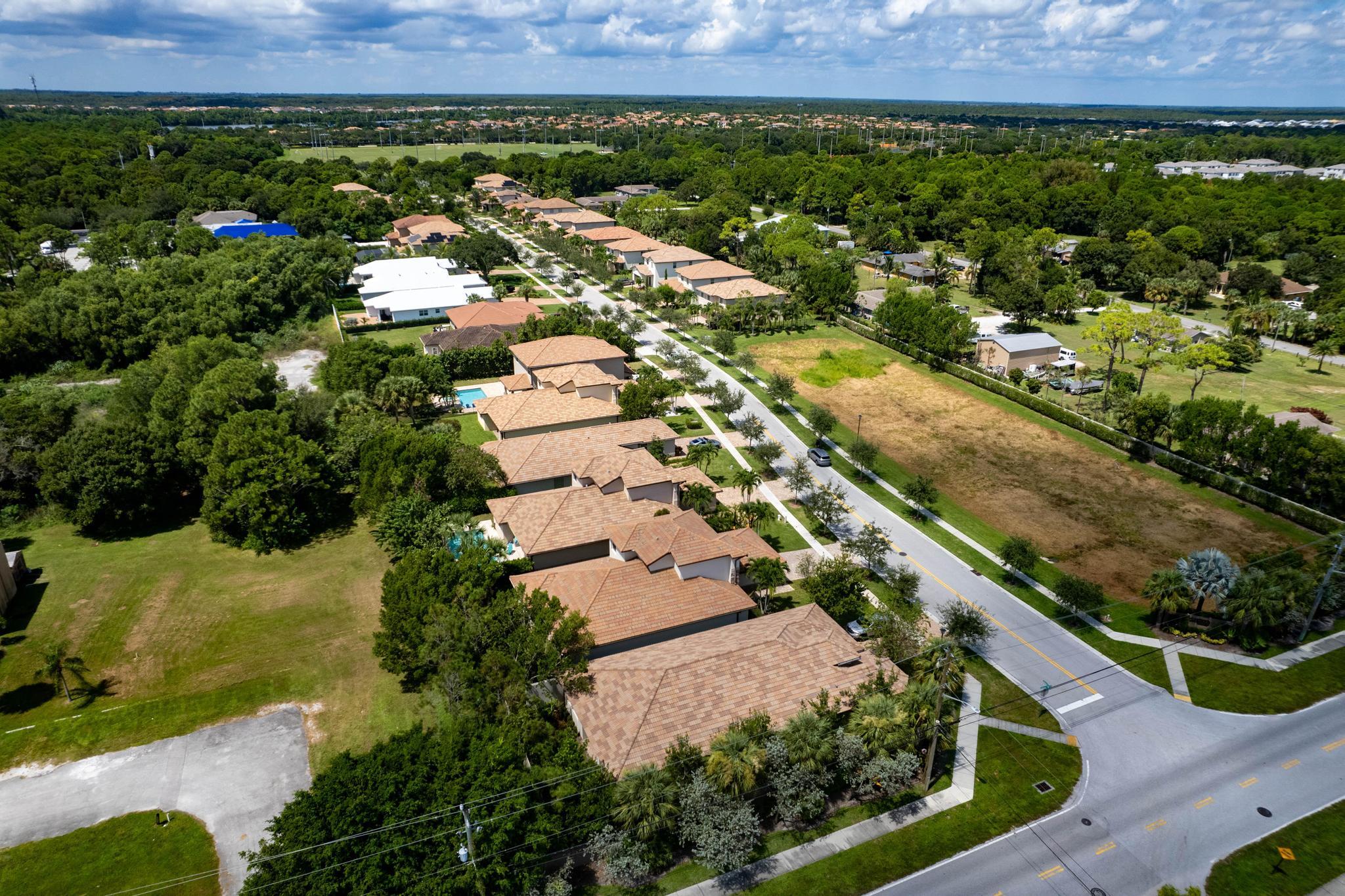 7034 Limestone Cay Road Jupiter, FL 33458 - Photo 38 of 43 an aerial view of multiple house