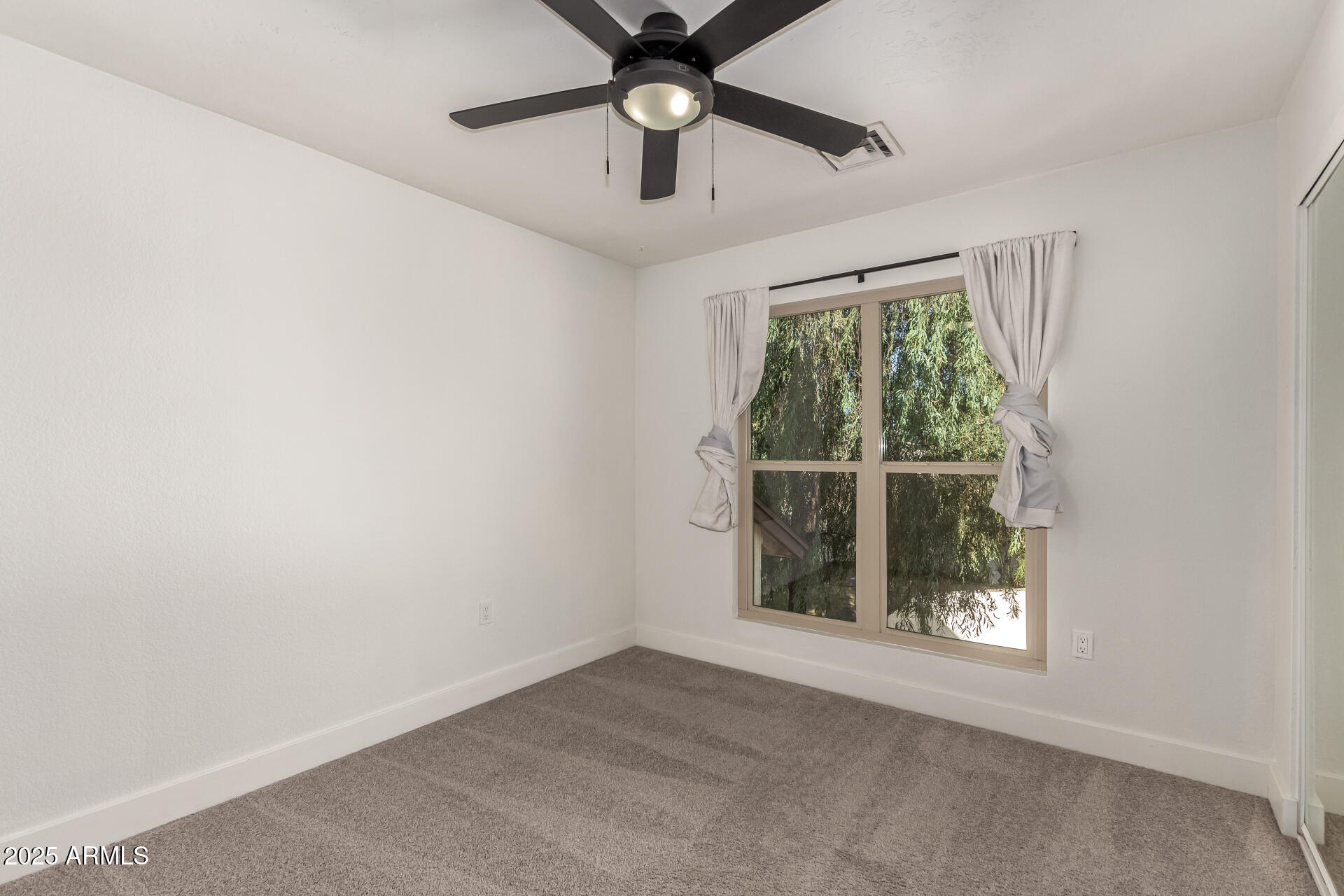 1621 North Chippewa Drive Chandler, AZ 85224 - Photo 17 of 25 an empty room with a window
