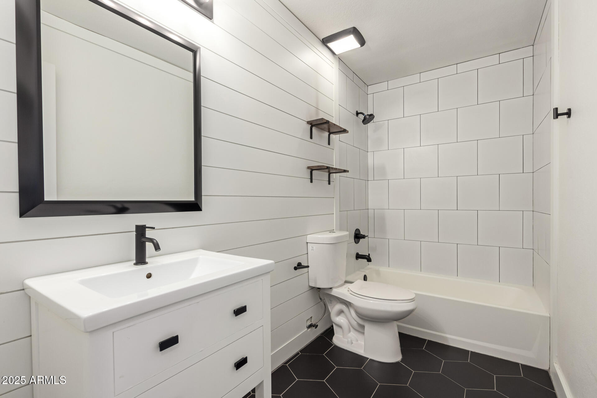 1621 North Chippewa Drive Chandler, AZ 85224 - Photo 18 of 25 a bathroom with a sink a toilet and shower