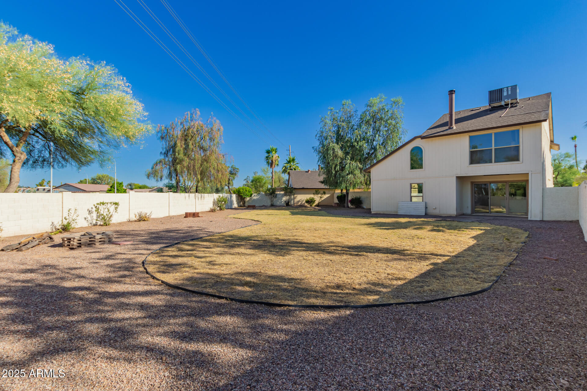 1621 North Chippewa Drive Chandler, AZ 85224 - Photo 23 of 25 a view of a house with a yard