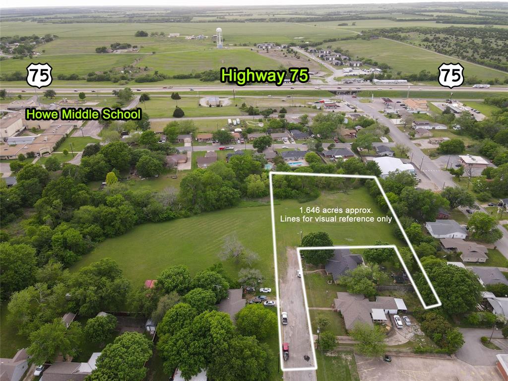 Tbd West Davis Street Howe, TX 75459 - Photo 2 of 3 Expansive undeveloped land totaling approximately 1.646 acres, featuring mature trees and a manicured grassy area