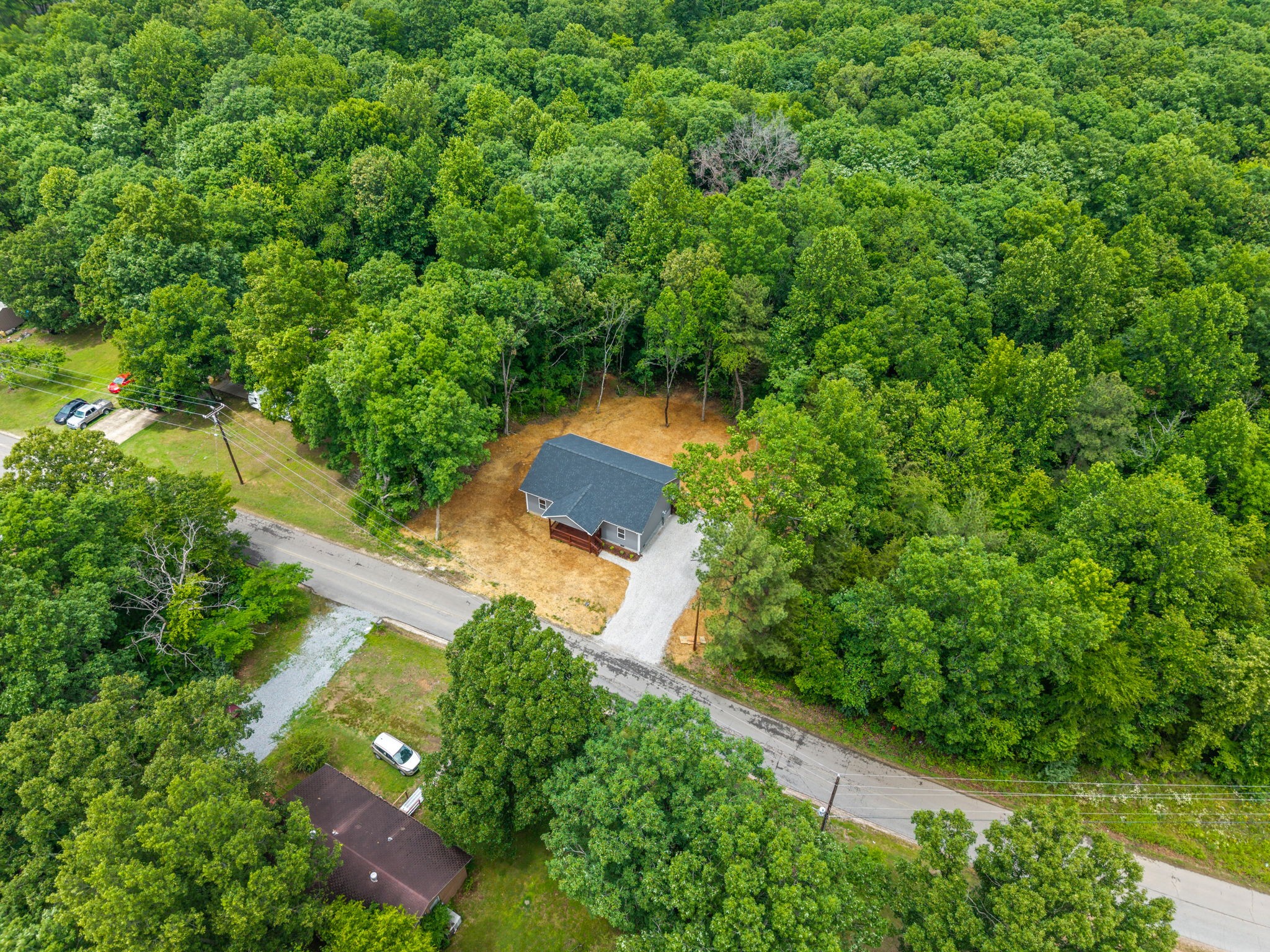 690 Brazzle Road Waverly, TN 37185 - Photo 31 of 35 an aerial view of a house with a yard