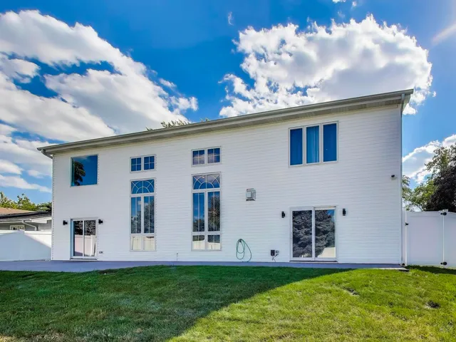 a view of a back yard of the house