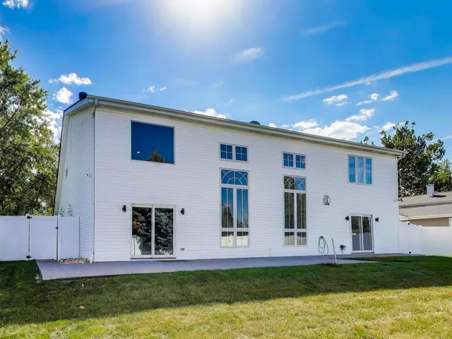 a view of front door and yard