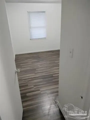 a view of small space with racks on the wall