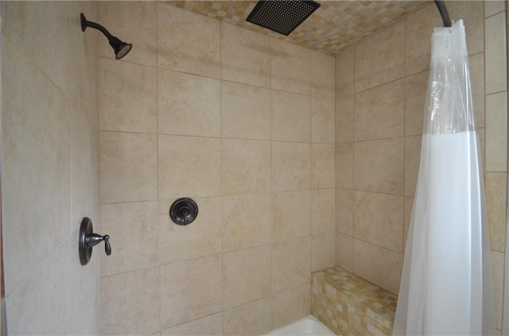 141 Youkers Road Butler, PA 16001 - Photo 14 of 25 Oversized full ceramic shower with rain shower head & bench