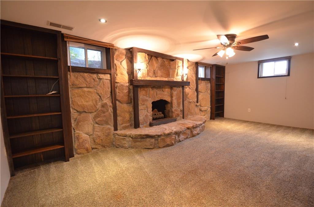 141 Youkers Road Butler, PA 16001 - Photo 20 of 25 Finished lower level game room boasts stone fireplace