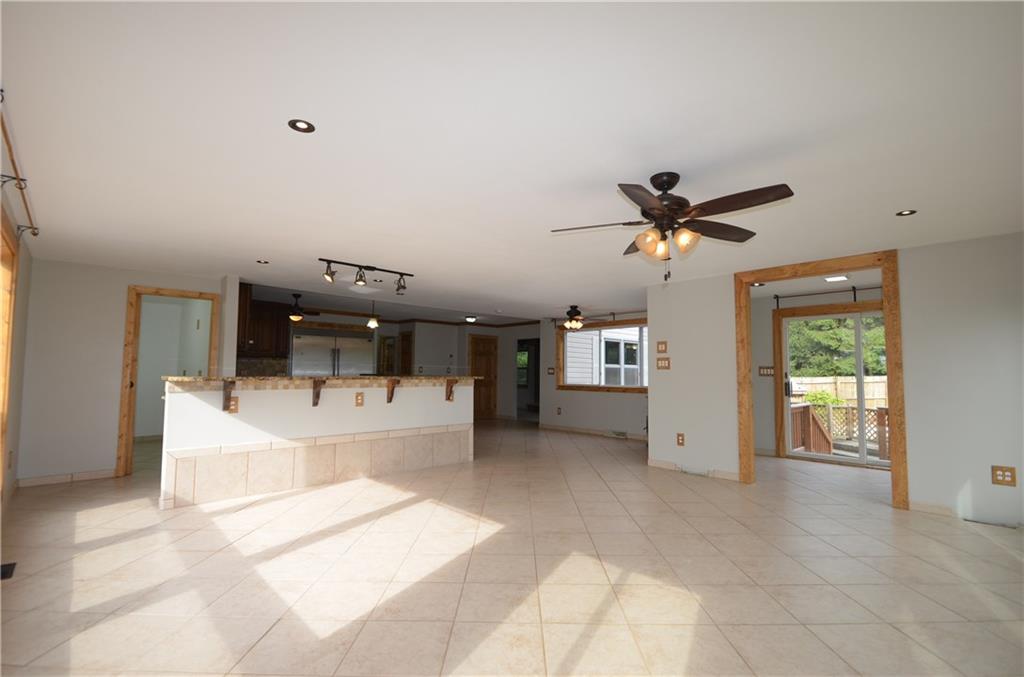 141 Youkers Road Butler, PA 16001 - Photo 8 of 25 The kitchen open to an expansive sun room