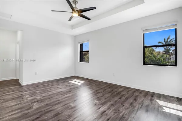 a view of a room that has a window in it