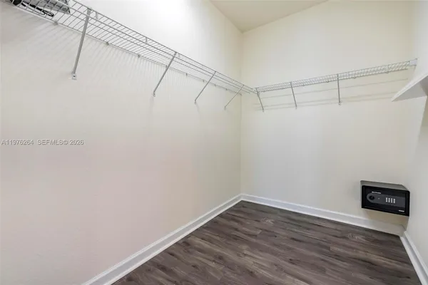 a view of a room with racks on the wall