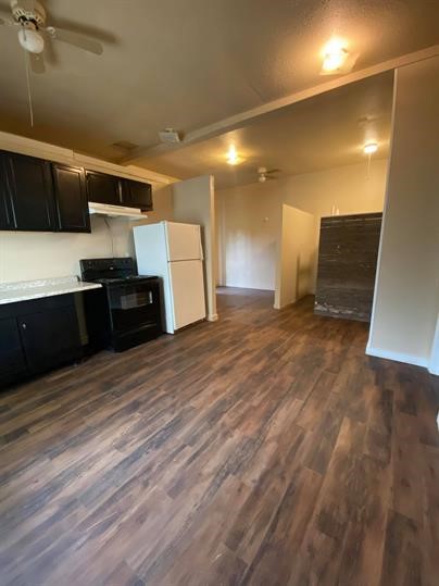 514 Ruddy Street, Unit B Lockhart, TX 78644 - Photo 1 of 1 a large kitchen with stainless steel appliances a large counter top