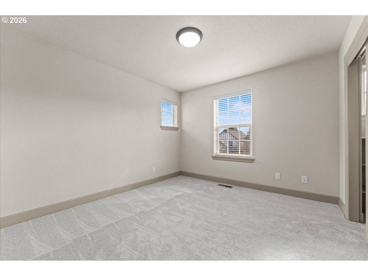 10899 Southwest Barber Street Wilsonville, OR 97070 - Photo 31 of 44 a view of an empty room