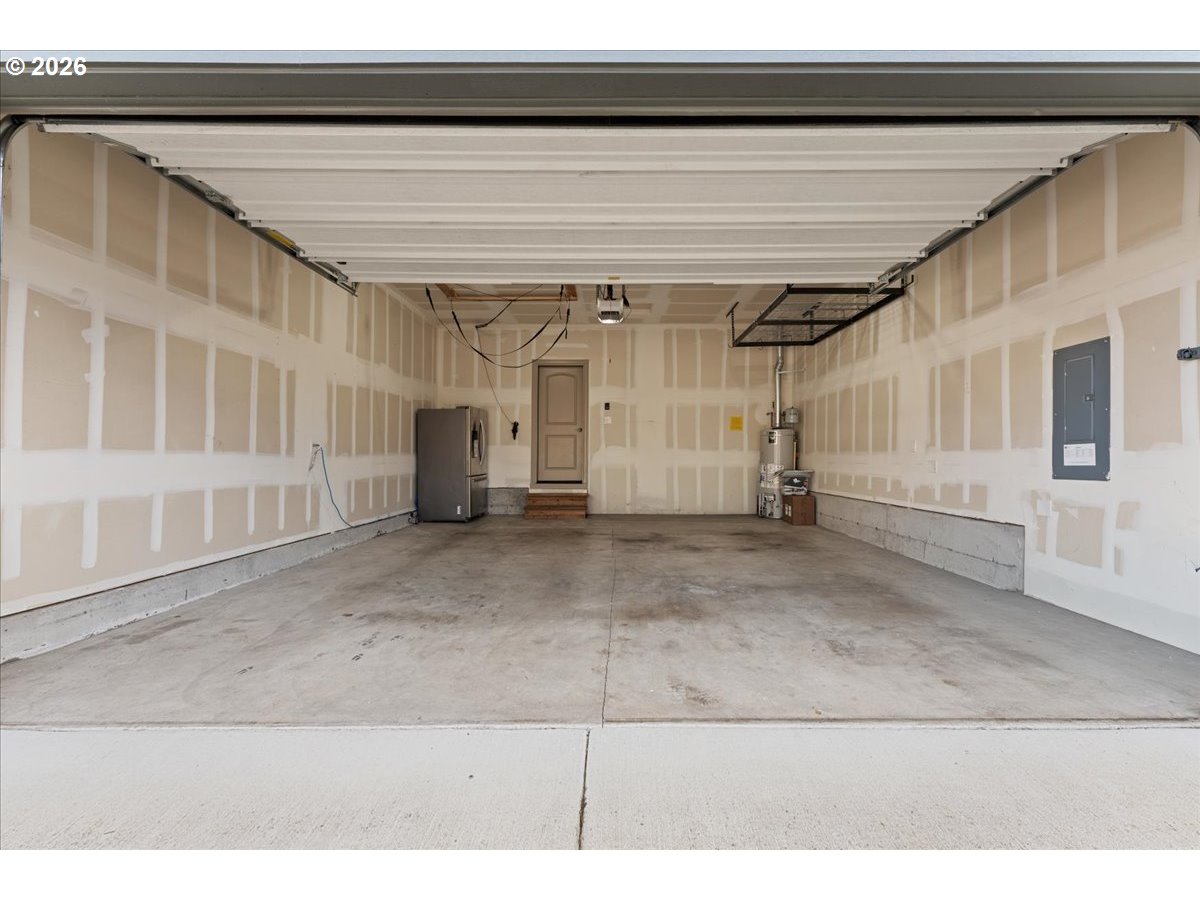 10899 Southwest Barber Street Wilsonville, OR 97070 - Photo 36 of 44 a view of a room with wooden floor