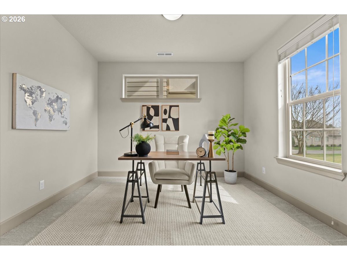 10899 Southwest Barber Street Wilsonville, OR 97070 - Photo 5 of 44 a dining room with furniture and window