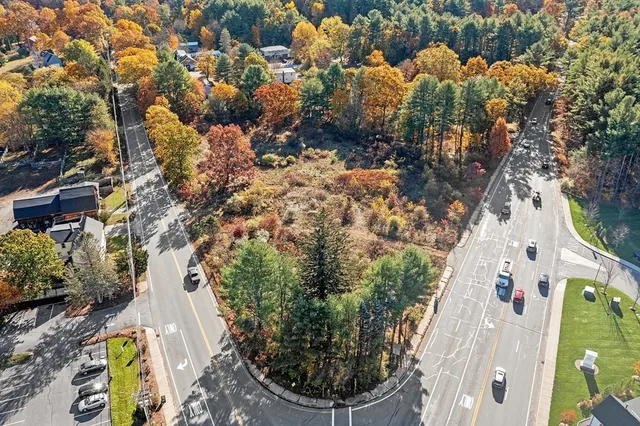 an aerial view of house with yard