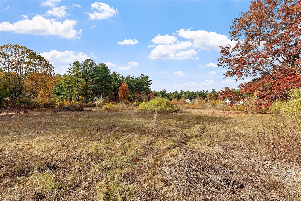 797 Boston Road Groton, MA 01450 - Photo 14 of 28 a view of a large yard with lots of green space