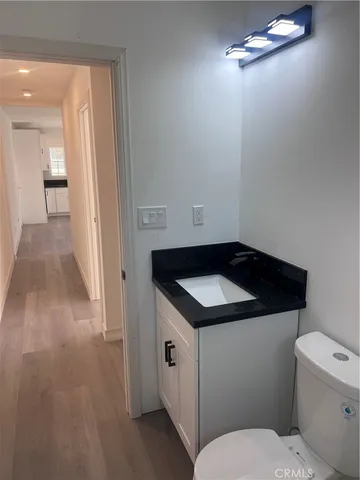 a kitchen with a sink and washing machine