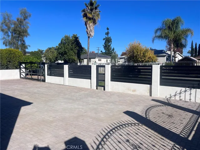 a view of a chairs and table on the wooden floor