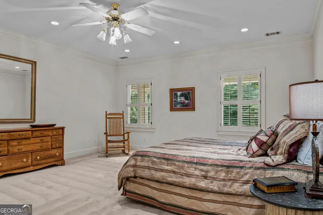 a kitchen with stainless steel appliances a refrigerator and cabinets