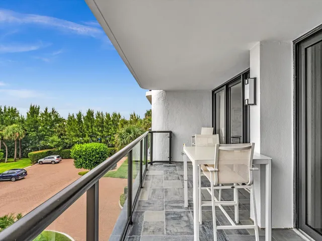 a bathroom with a granite countertop sink mirror and double