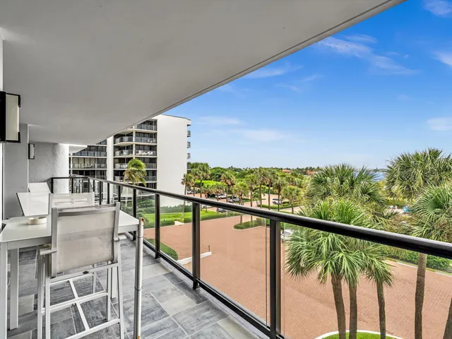 a bathroom with a sink double vanity and a toilet